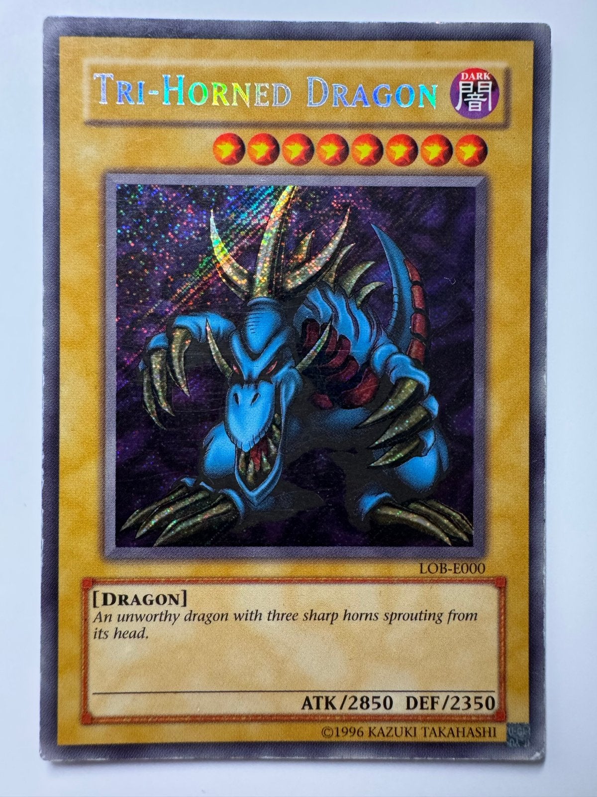 Yu-Gi-Oh! Tri-Horned Dragon LOB-E000 (Foil), Ophalen of Verzenden, Gebruikt, Losse kaart, Foil