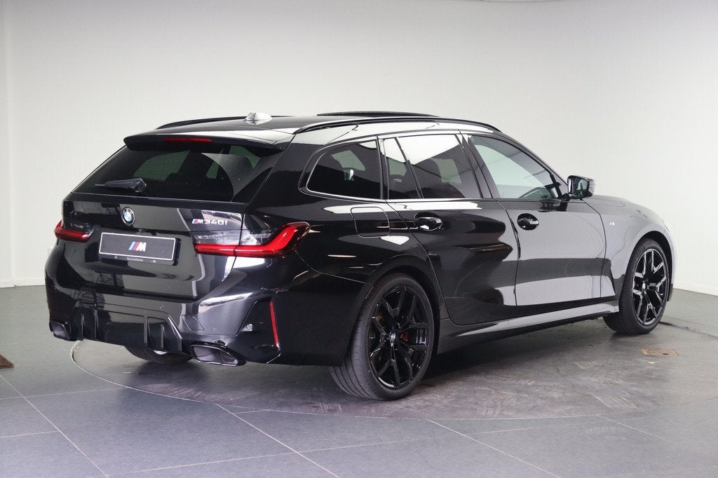 BMW 3 Serie Touring M340i xDrive Automaat / Panoramadak / Tr, Auto's, BMW, Automaat, Zwart, Automatische klimaatregeling, 1805 kg