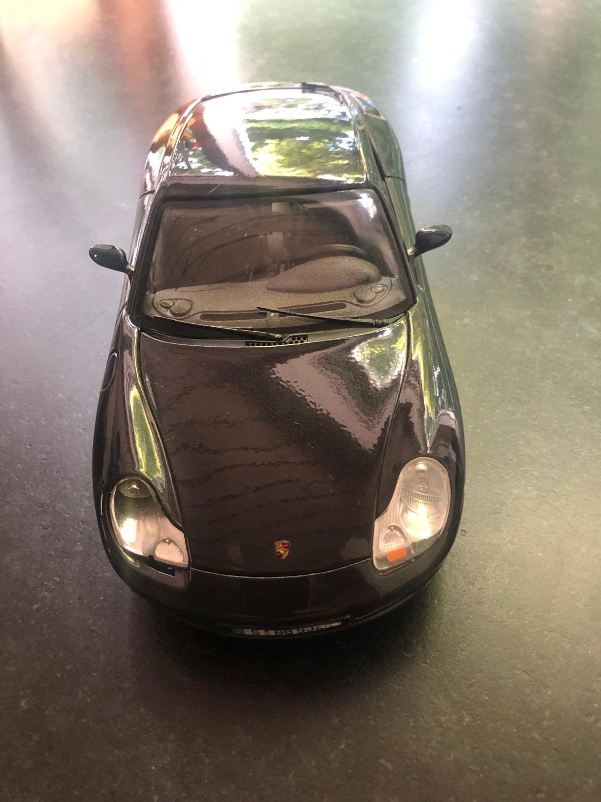 Porsche Carrera 4 modelauto - Zwart - Schaalmodel, Ophalen of Verzenden, Zo goed als nieuw, Auto, Overige merken