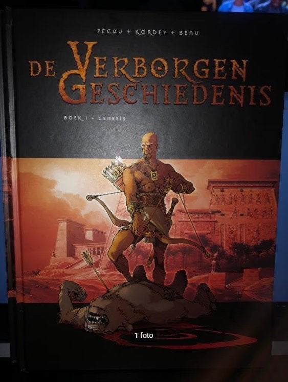Genesis de verborgen geschiedenis hardcover A1, Eén stripboek, Ophalen of Verzenden, Zo goed als nieuw