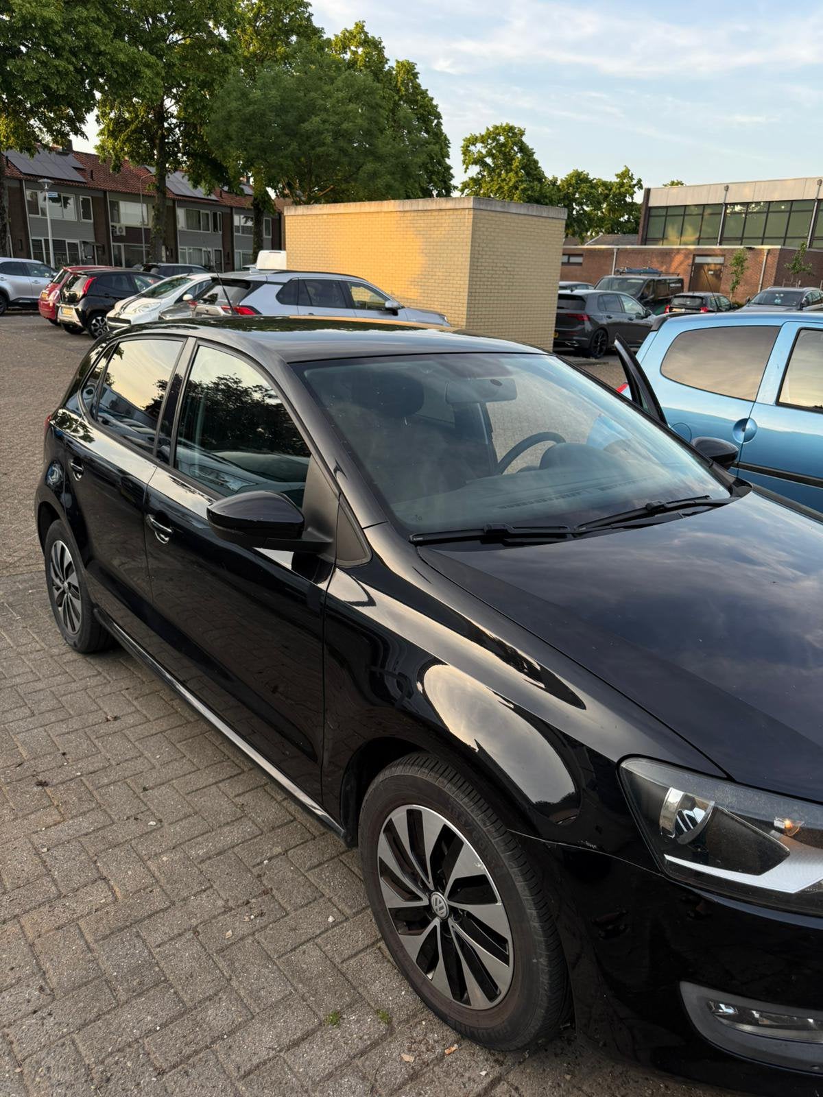 Volkswagen Polo 1.2 51KW 2009 Zwart, Auto's, Voorwielaandrijving, Euro 5, 967 kg, 40 €/maand