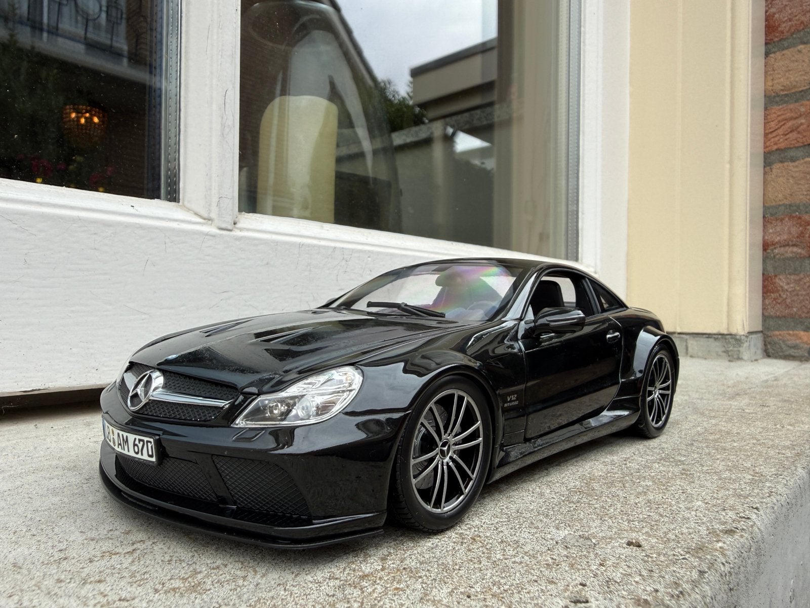 1:18 Mercedes R231 SL65 AMG Black Series 2009 Minichamps, Minichamps, Auto, Ophalen of Verzenden, Zo goed als nieuw