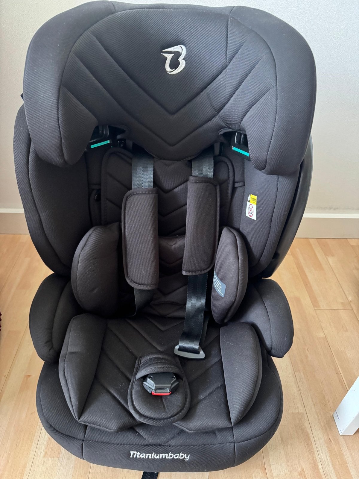 Titaniumbaby autostoel - Zo goed als nieuw, Autogordel, Verstelbare rugleuning, Zo goed als nieuw, 9 t/m 36 kg