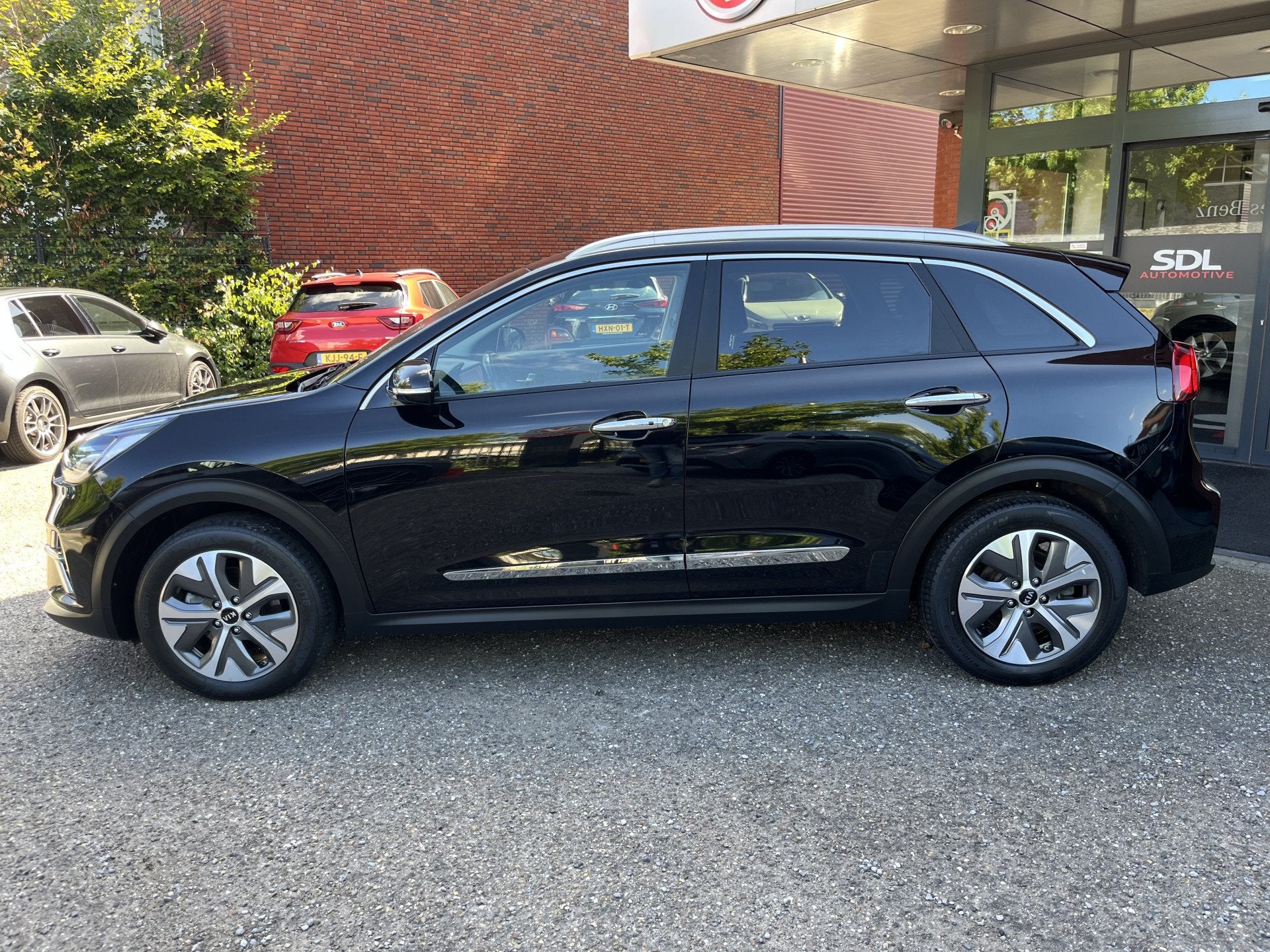 Foto 3 van Kia e-Niro ExecutiveLine 64.8 kWh 94%SOH // SCHUIF-KANTELDAK