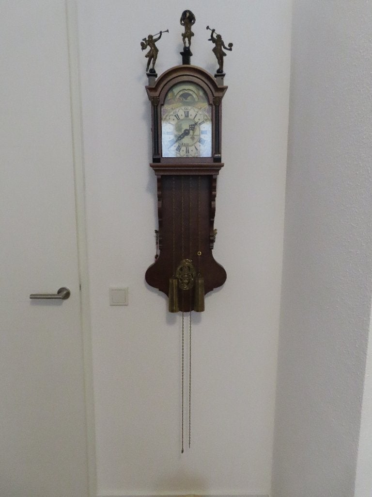 Te koop Friese hangklok, Ophalen