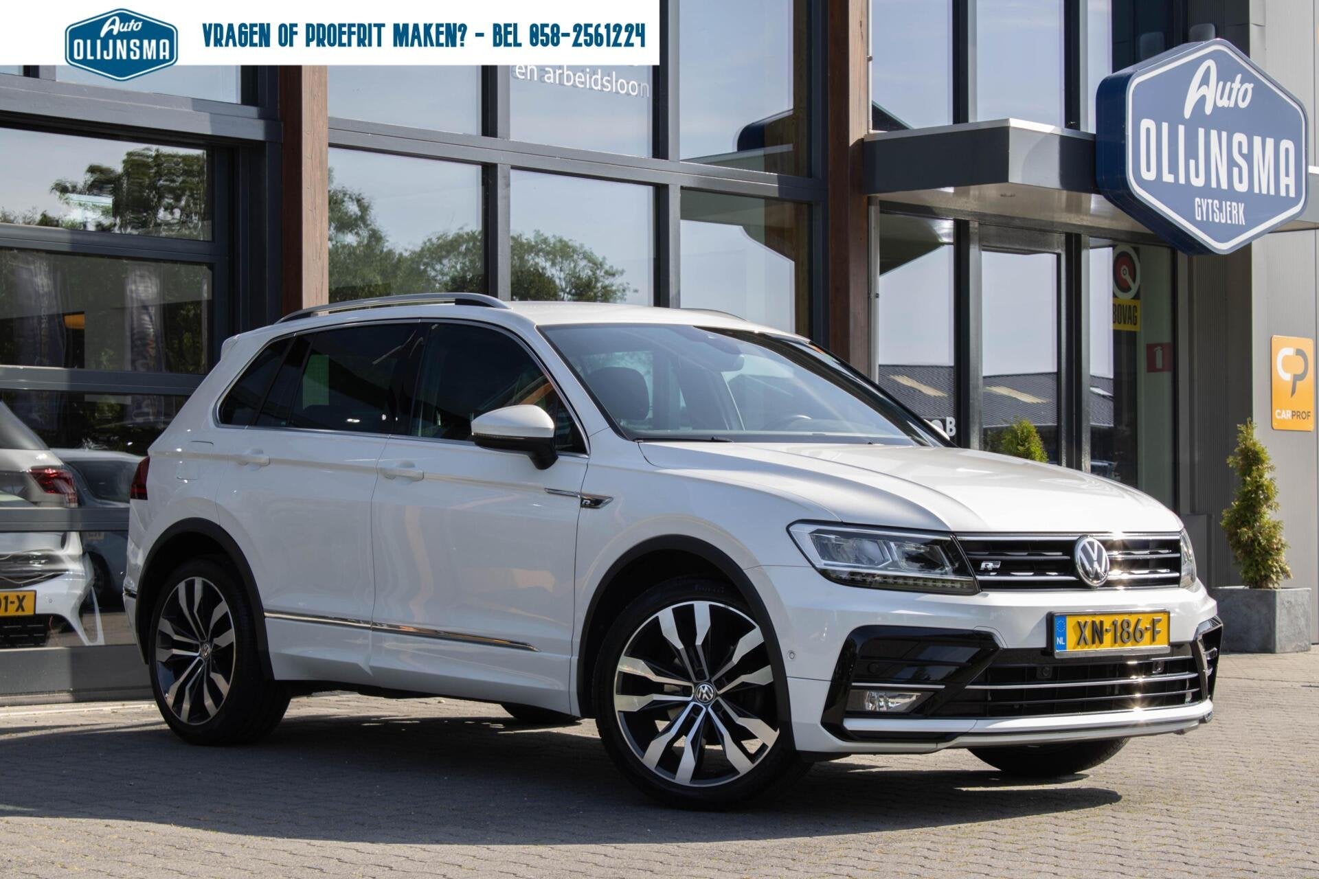 Volkswagen Tiguan 1.5 TSI ACT Highline Business R|Trekhaak|C, Auto's, 15 km/l, Alcantara, Wit, Origineel Nederlands
