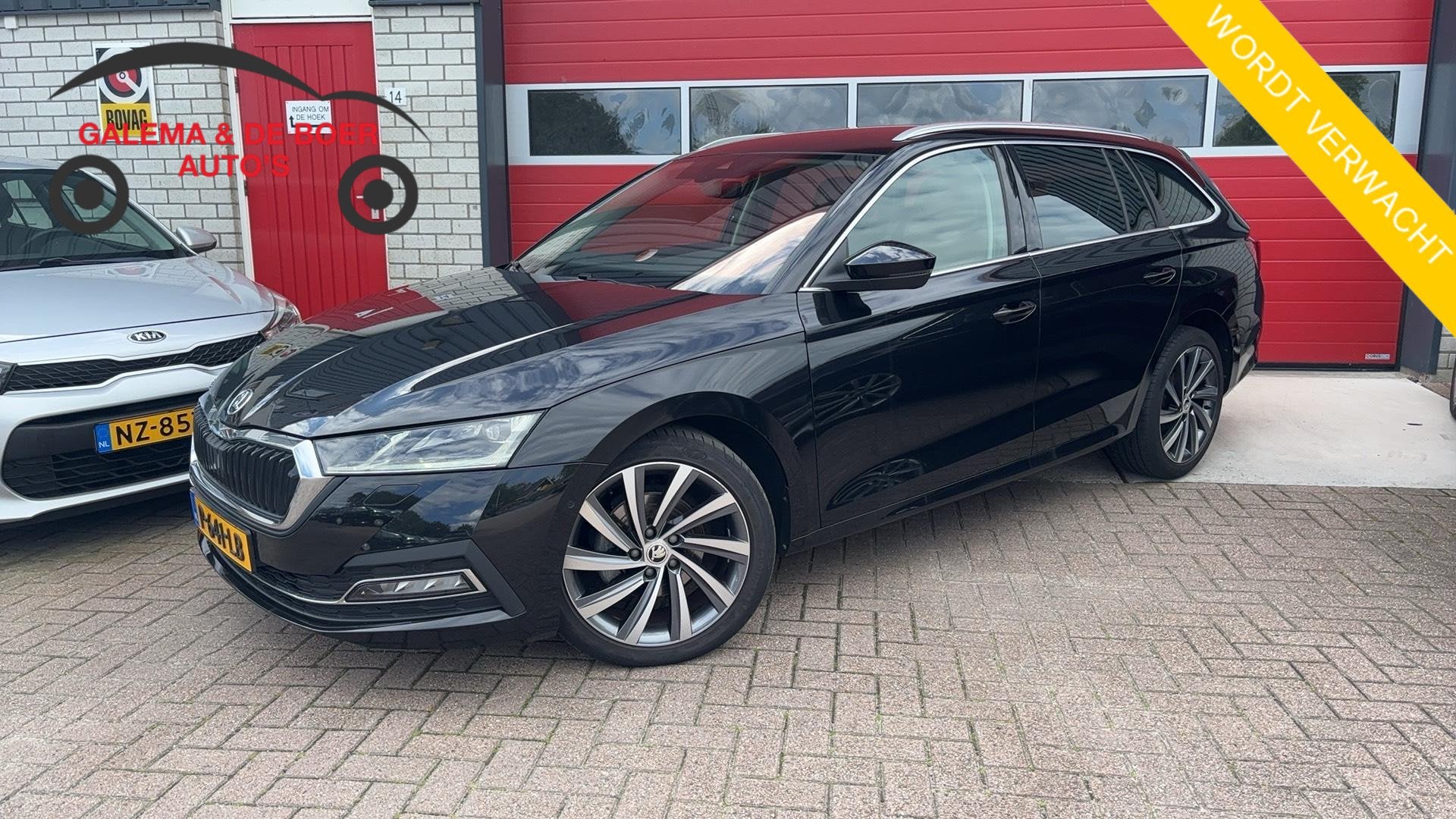 Skoda Octavia Combi 1.5 e-TSI Business Edition Plus AUTOMAAT, Auto's, Skoda, 4 cilinders, Zwart, 1316 kg, Automatische klimaatregeling