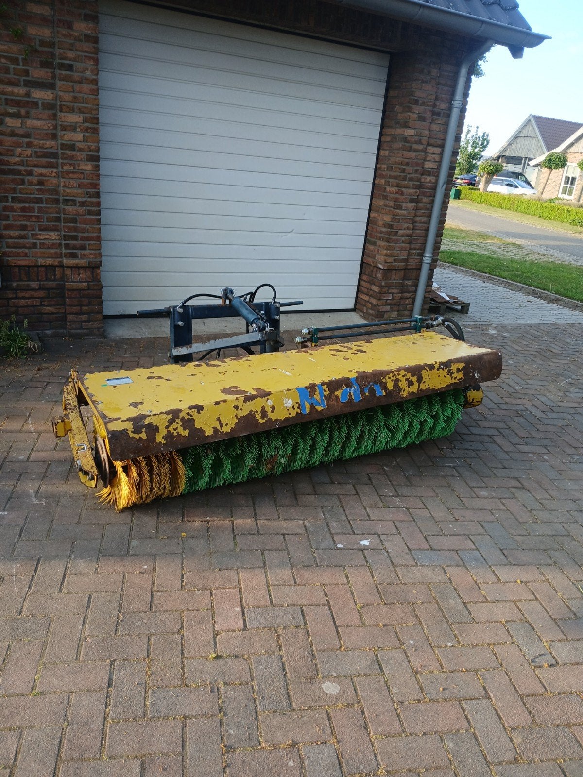 Nido hydraulische veegmachine, Ophalen
