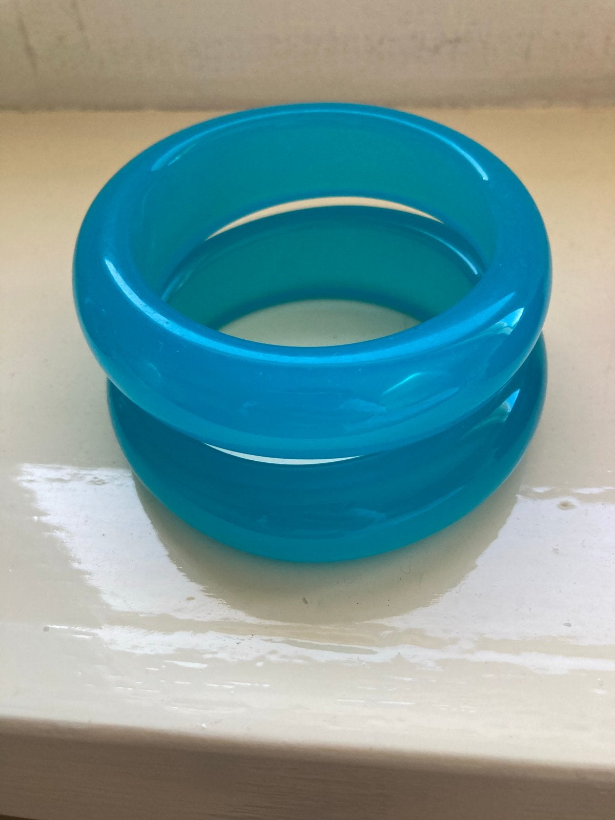 Set van 2 turquoise armbanden, Sieraden, Tassen en Uiterlijk, Armbanden, Ophalen of Verzenden, Nieuw, Blauw, Kunststof of Plastic