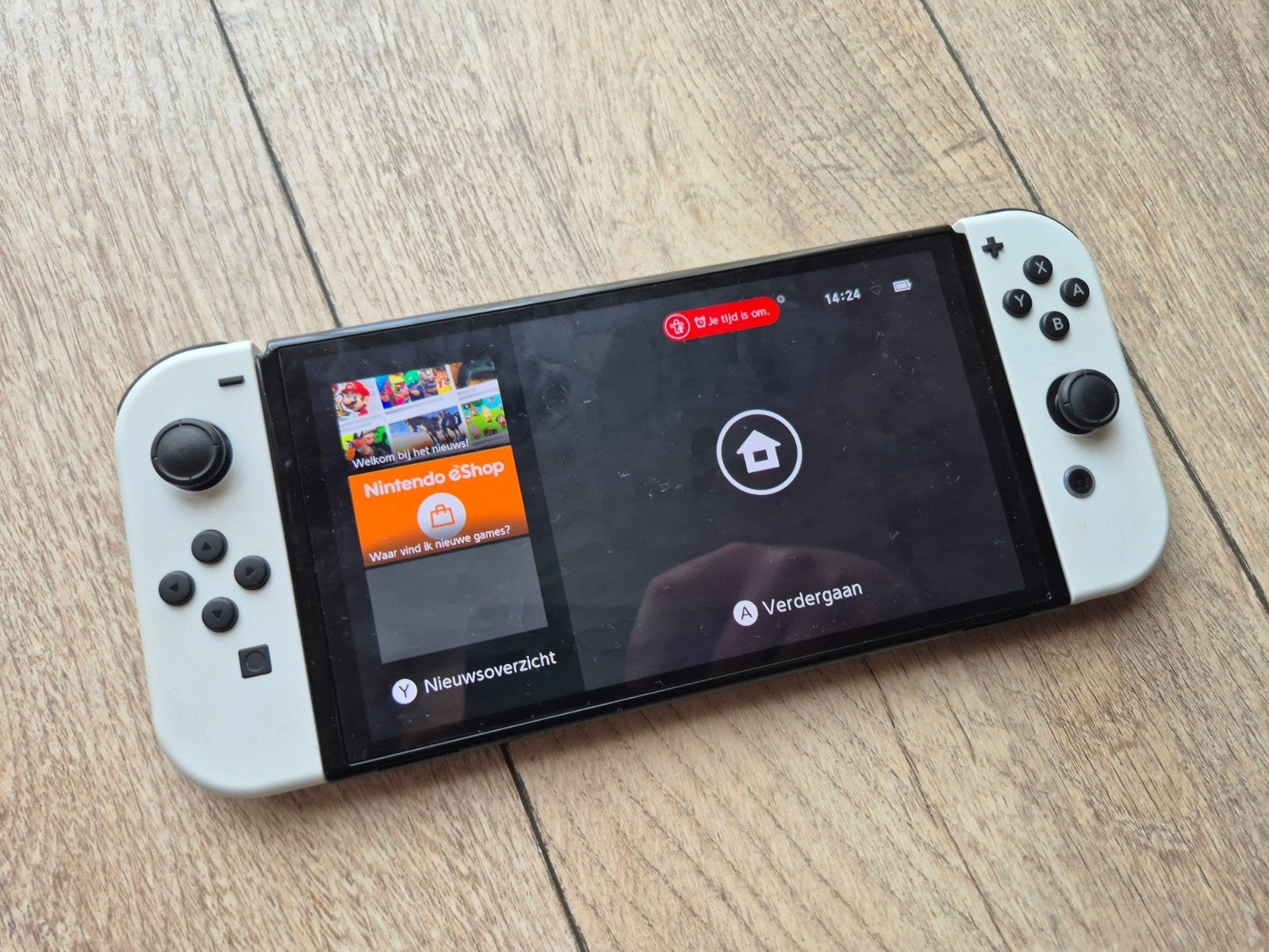 Nintendo Switch OLED - Wit, Spelcomputers en Games, Spelcomputers | Nintendo Switch, Ophalen, Zo goed als nieuw, Met 2 controllers