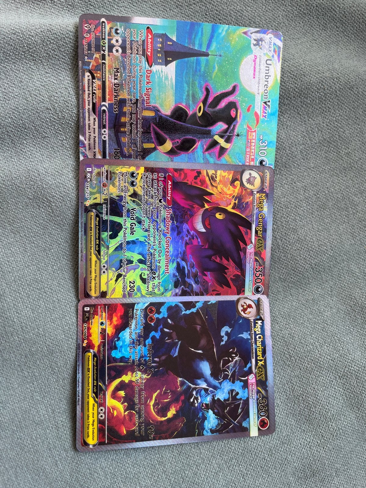 Pokémon kaarten: Umbreon, Gengar, Charizard VMAX/EX, Ophalen of Verzenden, Zo goed als nieuw, Meerdere kaarten, Foil