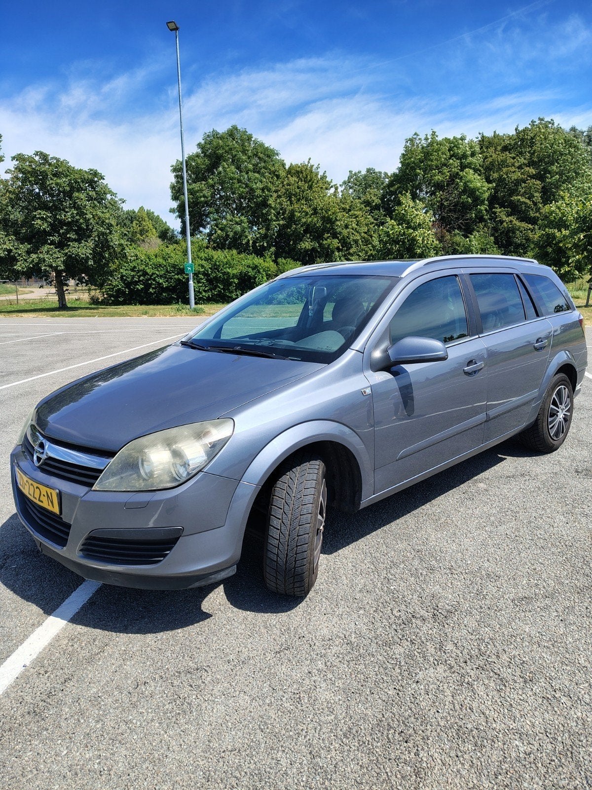 Opel Astra 1.6 16V St.wgn. 2006 Grijs, Auto's, Voorwielaandrijving, 15 km/l, 4 cilinders, Stationwagon