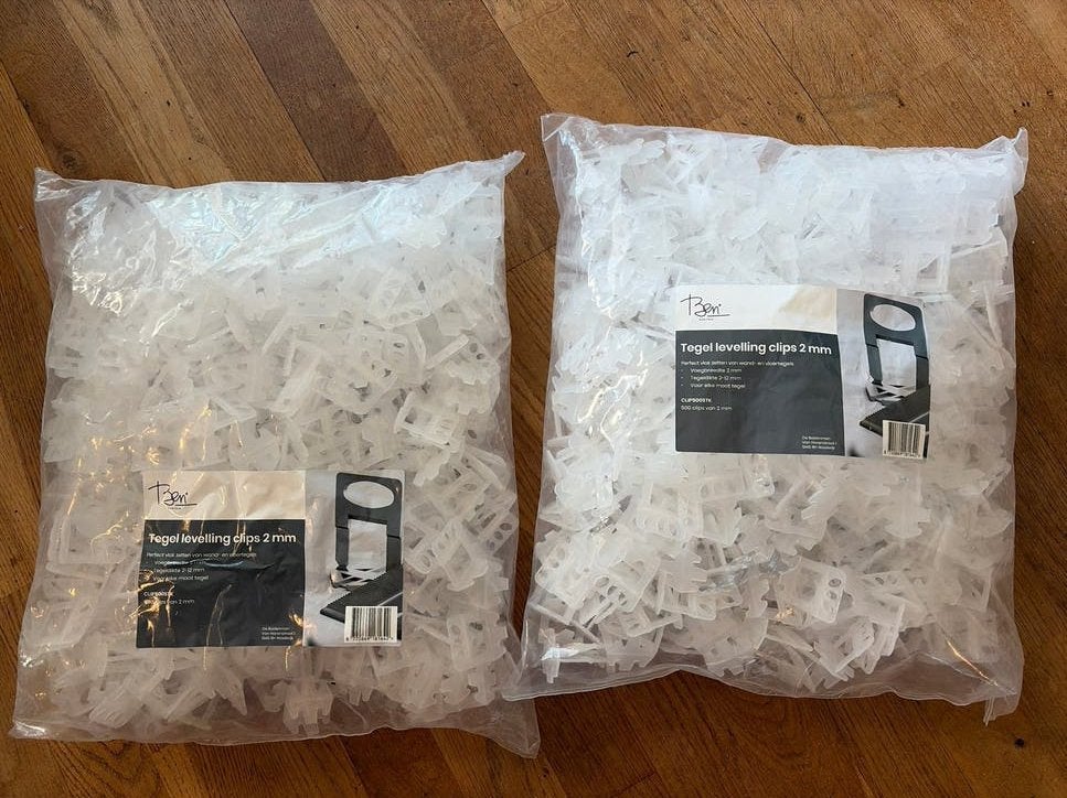 4 zakken Ben tegel levelling clips 2 mm 500 stuks per zak, Overige materialen, Overige typen, Nieuw, Ophalen of Verzenden