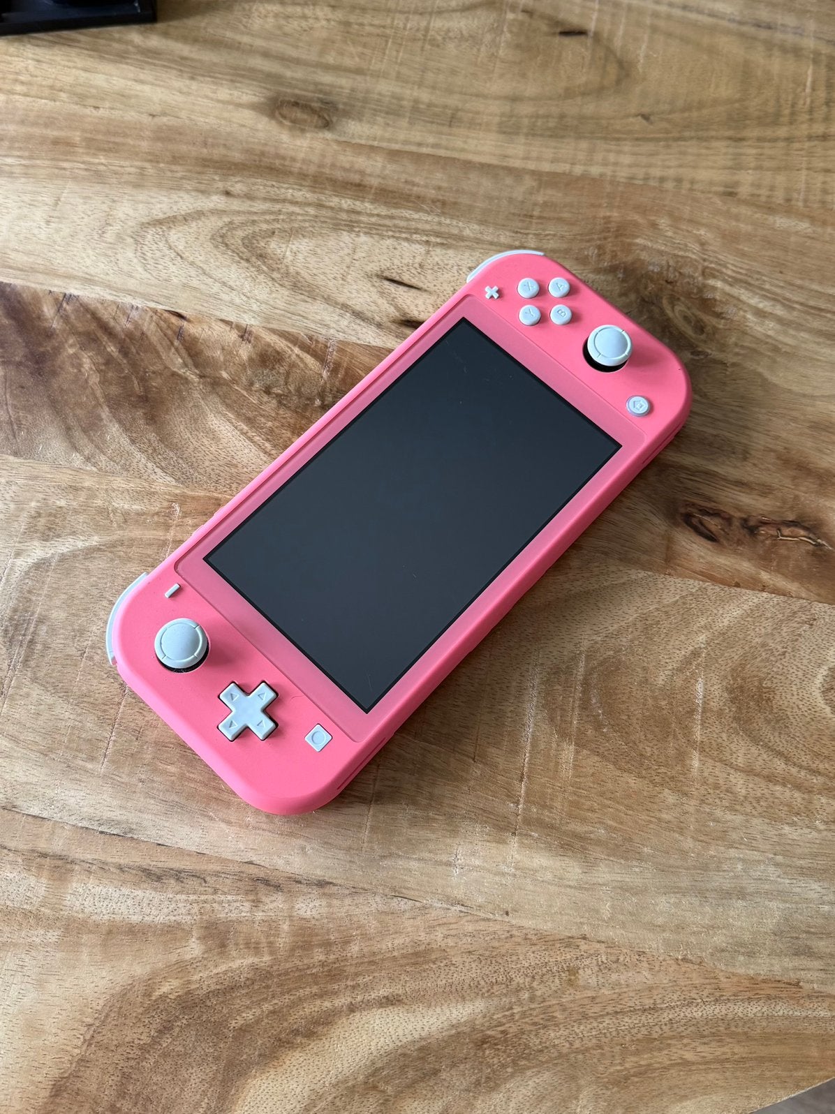 Nintendo Switch Lite - Kleur Koral - Met 128GB Micro SD Card, Ophalen, Roze of Coral, Gebruikt, Met beschermhoes of tas