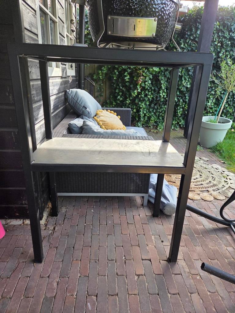 Ijzeren tafel/rek, Ophalen