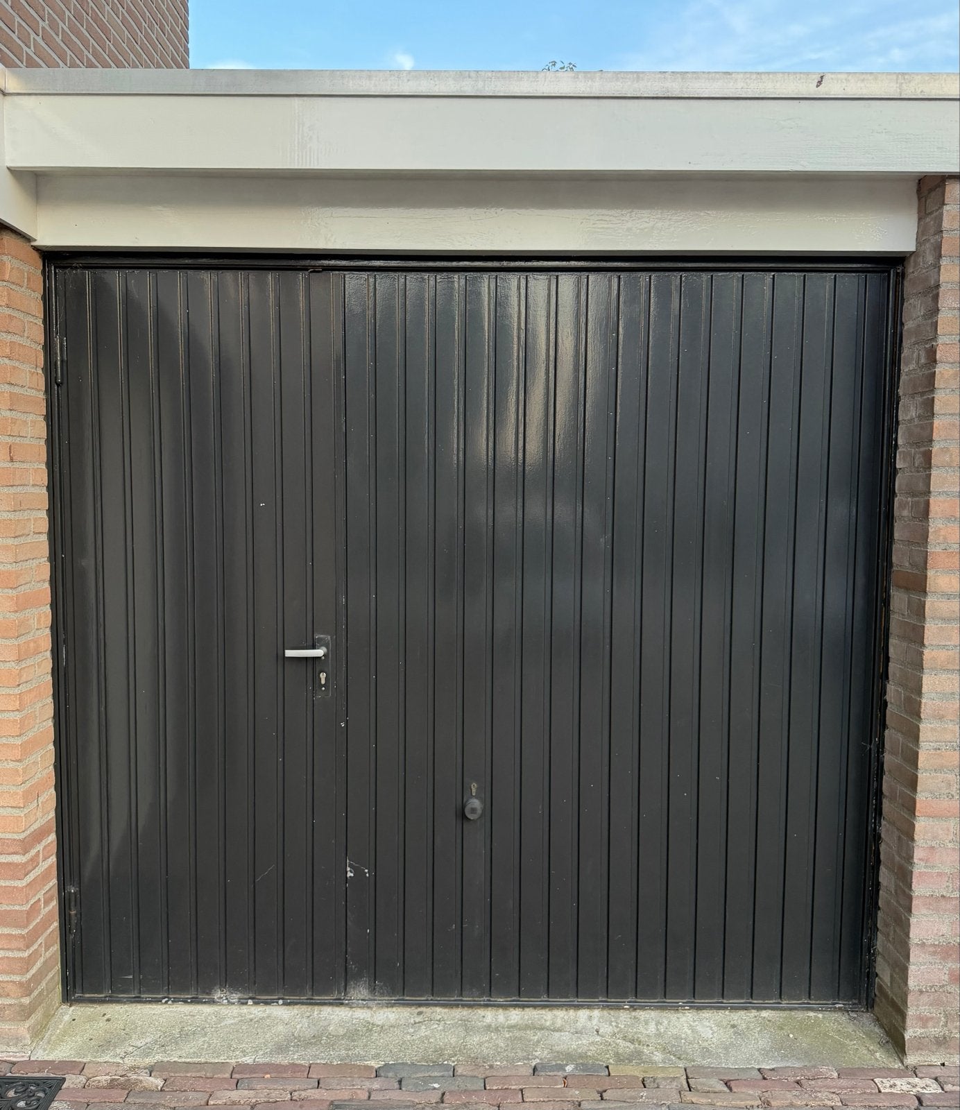 Antraciet garagedeur met loopdeur, Doe-het-zelf en Verbouw, Ophalen, Gebruikt, 120 cm of meer, Garagedeur