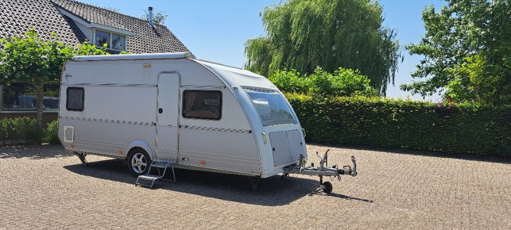 Caravan Kip Hyline met zonnepaneel, luifel, vloerverwarming, Caravans en Kamperen, Kachel, Omvormbare zithoek, Rondzit, Kip