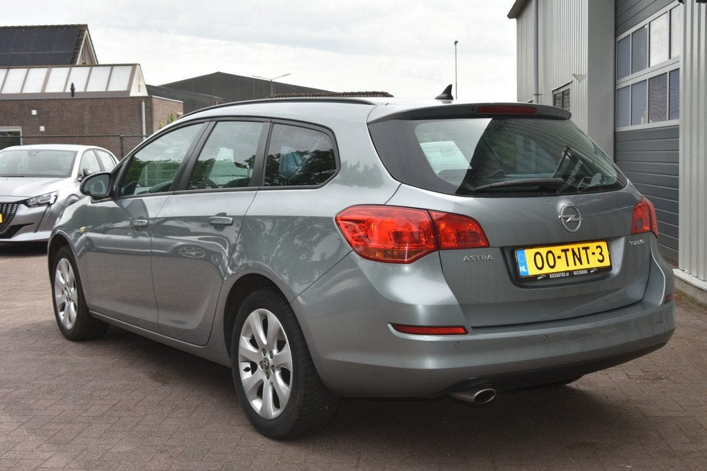 Opel Astra Sports Tourer 1.4 Turbo Edition AUTOMAAT! nieuwe, Auto's, Opel, Euro 5, 15 km/l, Gebruikt, 4 cilinders