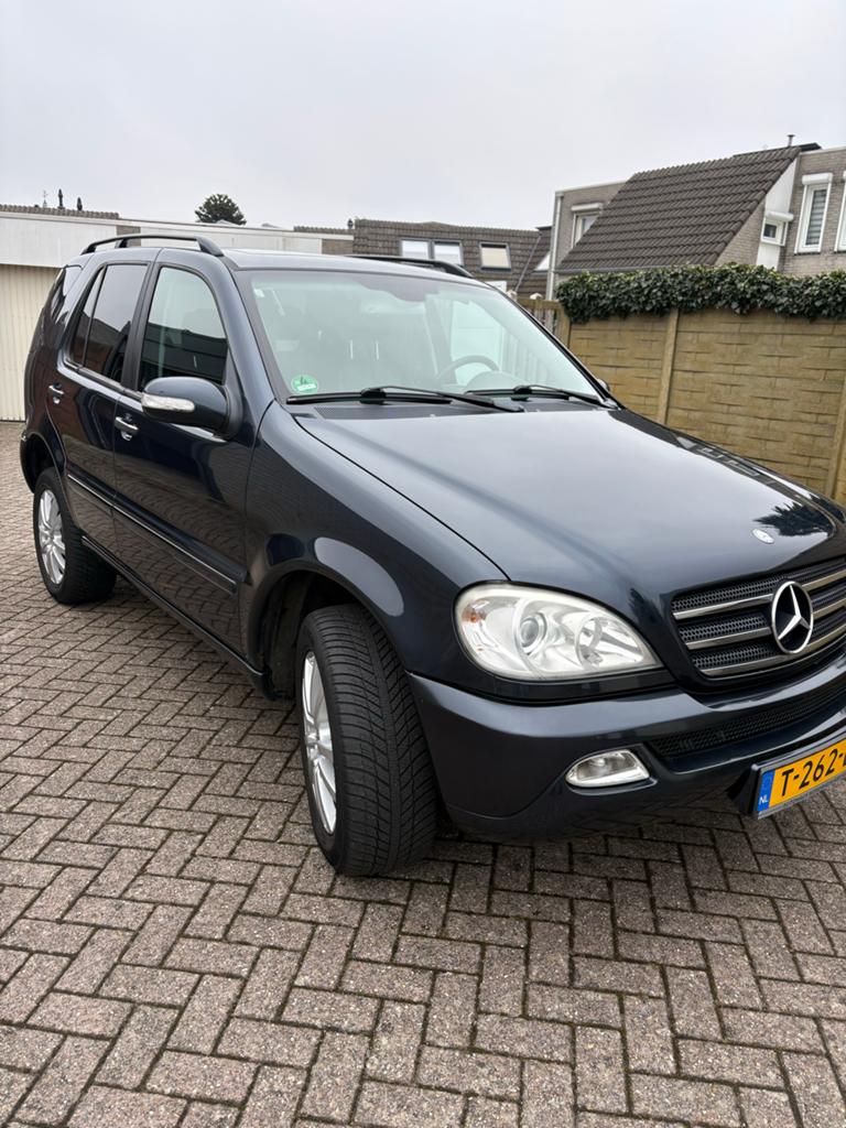 Mercedes-Benz M-Klasse 5.0 Ml500 4MATIC AUT 2003 Zwart, Auto's, Automaat, 8 cilinders, 138 €/maand, Zwart