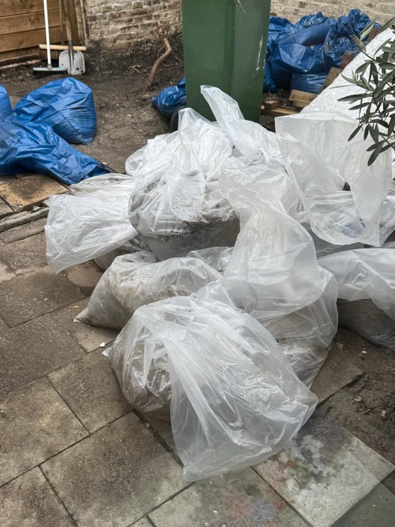 Gratis - zand/straatzand in puinzakken, Ophalen, Gebruikt, Ophoogzand