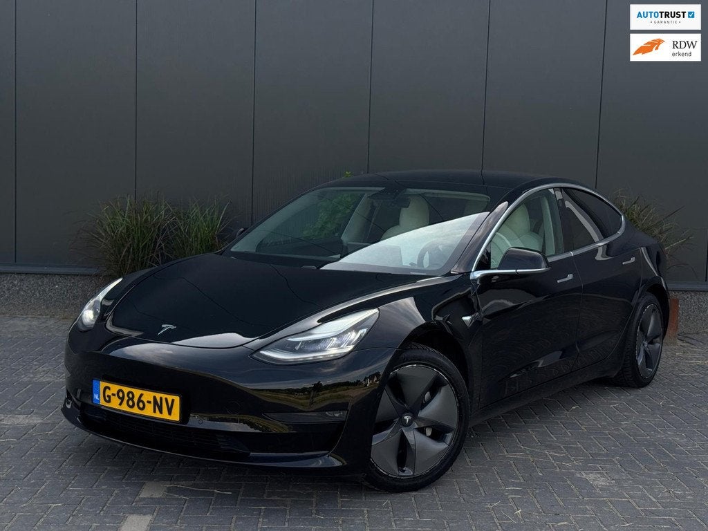 Tesla Model 3 Long Range AWD 75 kWh NAVI | LEDER | CAMERA |, Auto's, Automaat, Met garantie (alle), Zwart, Stoelverwarming