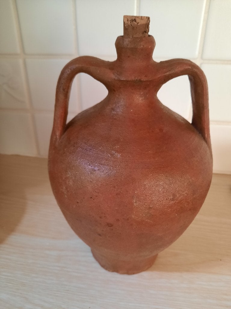 aardewerk kruikje, Ophalen