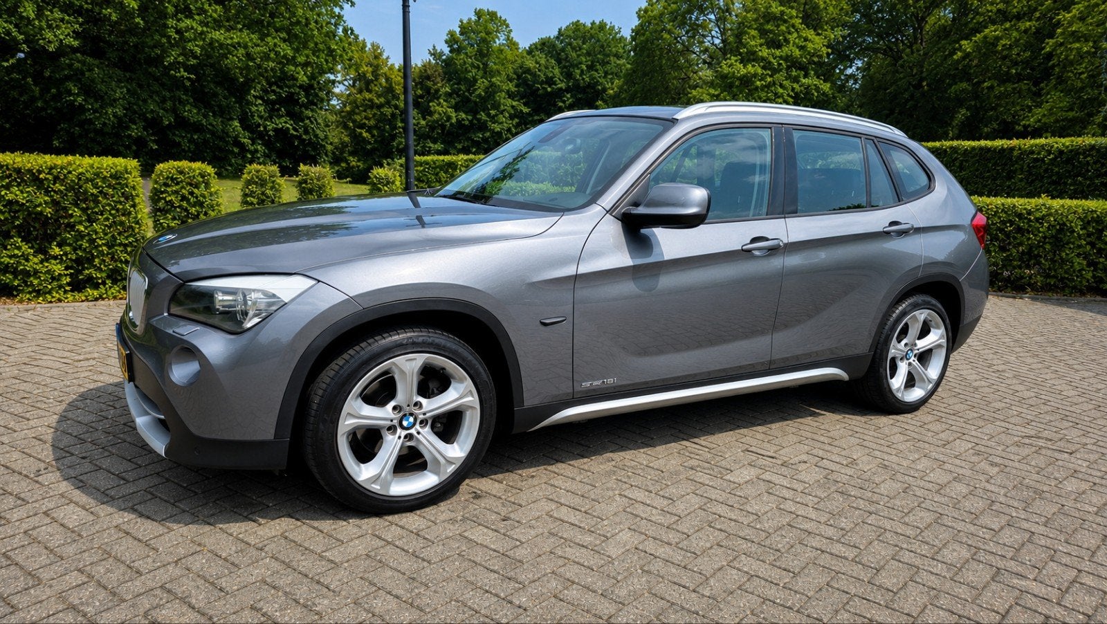 BMW X1 2.0 Sdrive 18I 2012 Grijs, X1, Achterwielaandrijving, Leder, Handgeschakeld