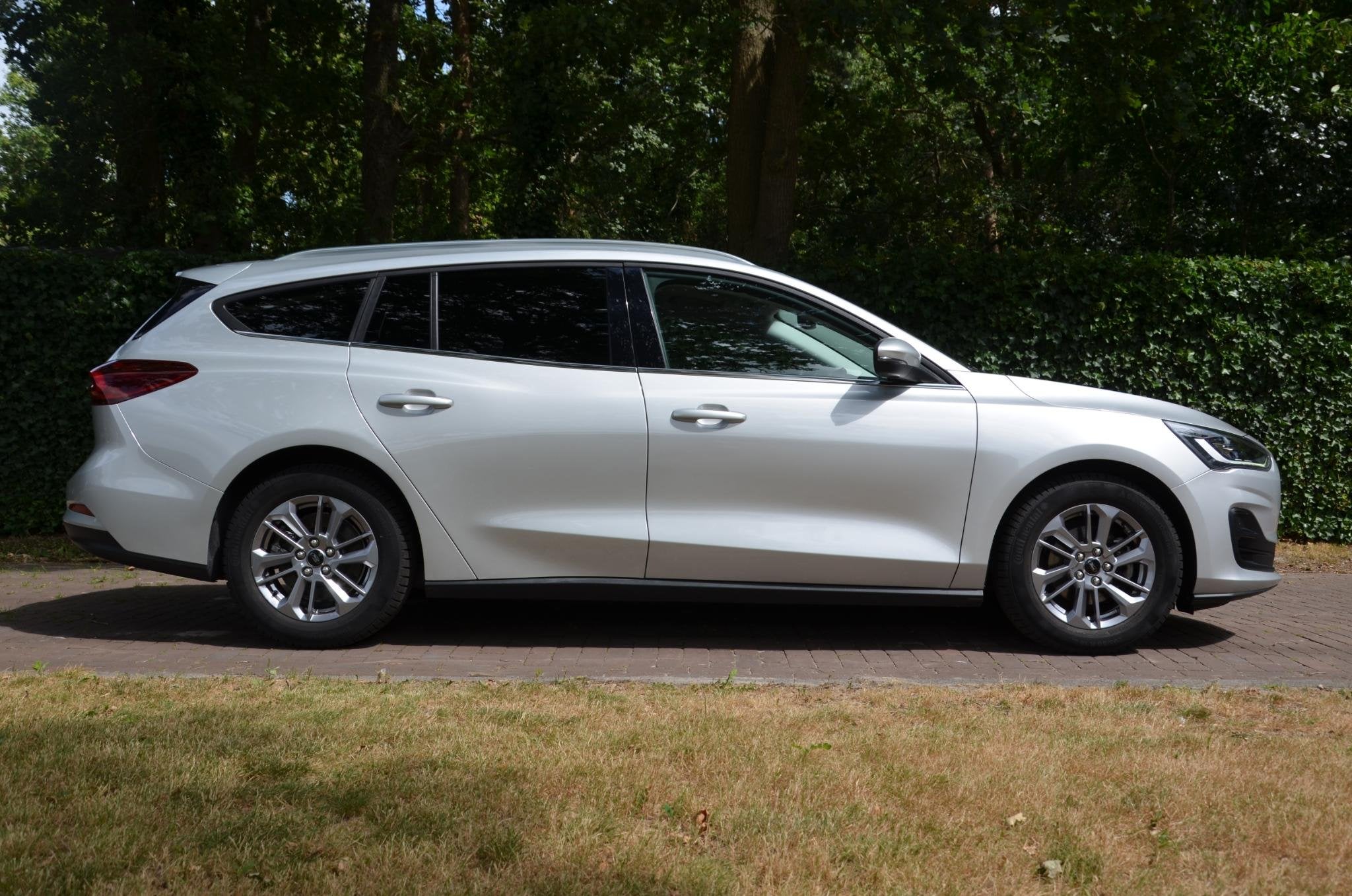 Ford Focus Wagon 1.0 EcoBoost Hybrid Titanium Navi/Pdc/Ecc/L, Gebruikt, Origineel Nederlands, Handgeschakeld, 19 km/l