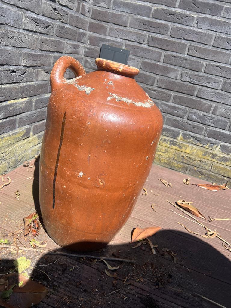 Antieke geglazuurde terracotta kruik met handvat, Ophalen