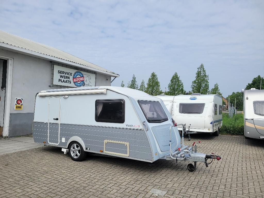 Kip Vison caravan uit 2010, Caravans en Kamperen, Caravans, Bedrijf, tot en met 2, 750 - 1000 kg, Treinzit, Kip, 2 aparte bedden