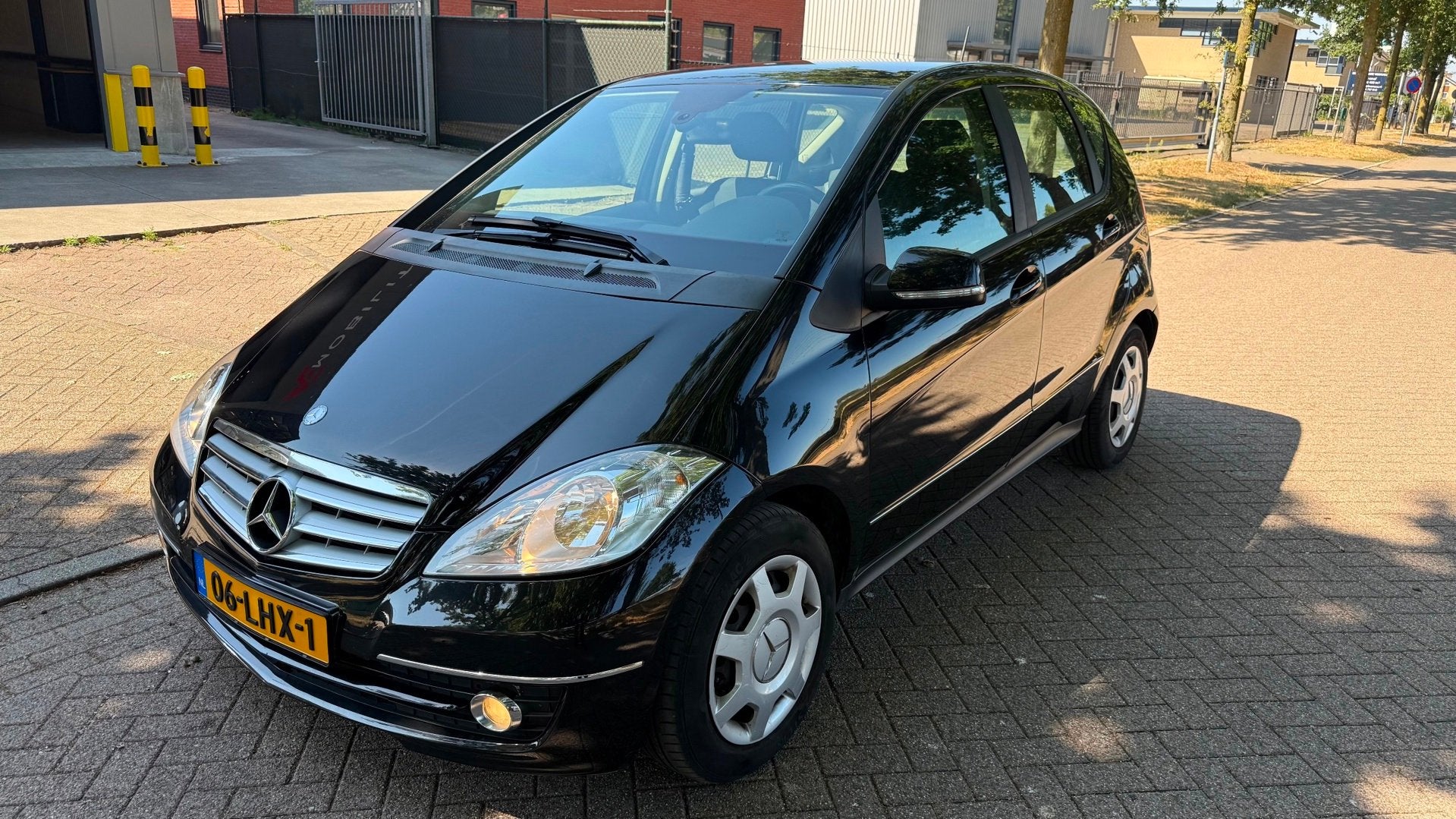 Mercedes-Benz A-klasse 160 Business Class Avantgarde AUTOMAA, 15 km/l, Leder en Stof, Zwart, Navigatiesysteem