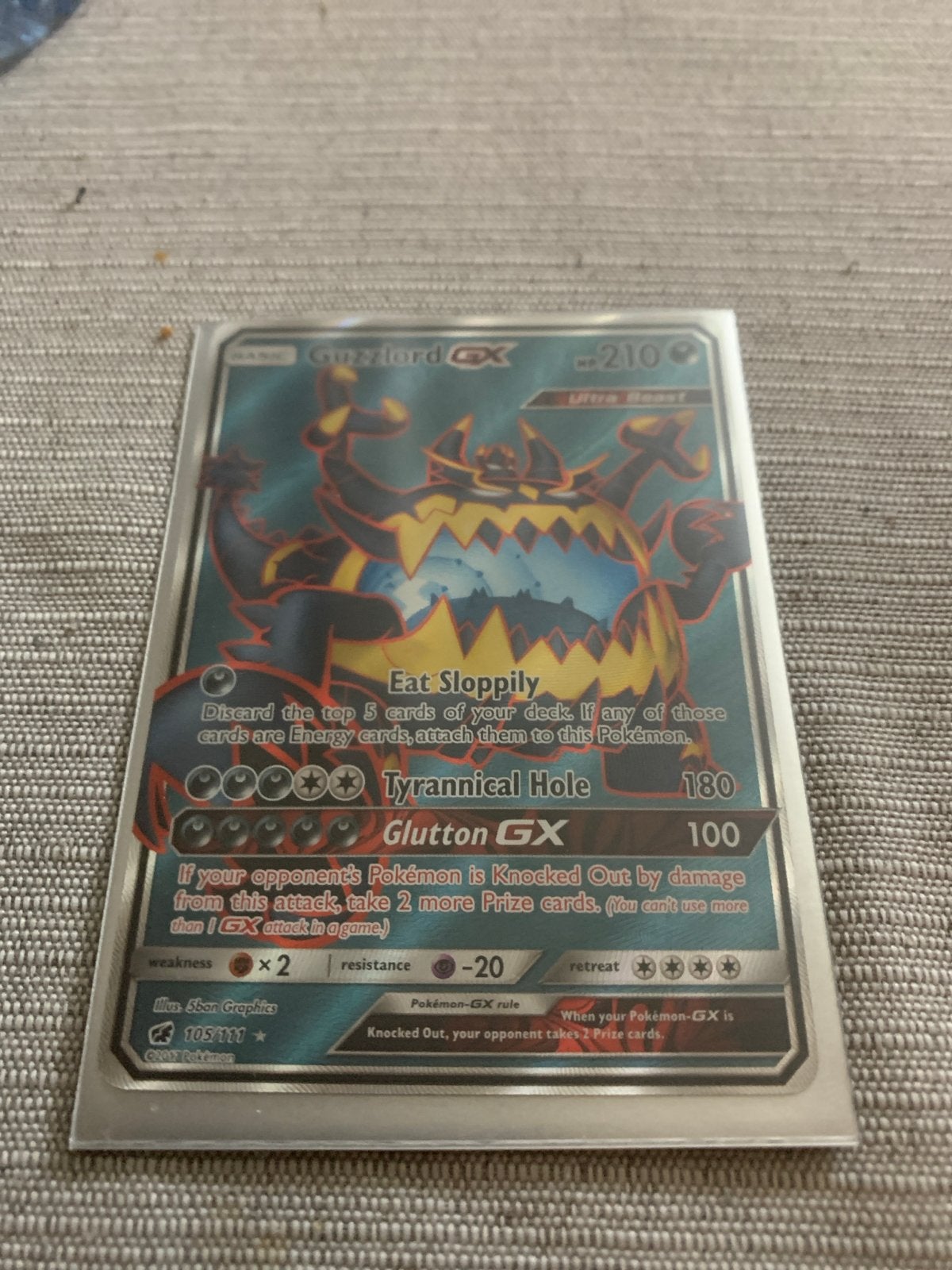 Guzzlord GX Pokémon kaart - Ultra Rare, Ophalen, Zo goed als nieuw, Losse kaart