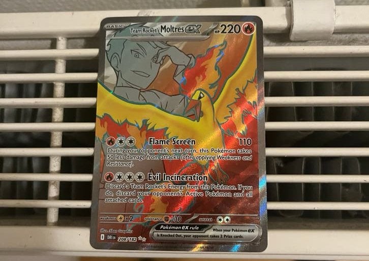 Team Rocket's Moltres EX Pokémon Kaart, Ophalen of Verzenden, Zo goed als nieuw, Losse kaart