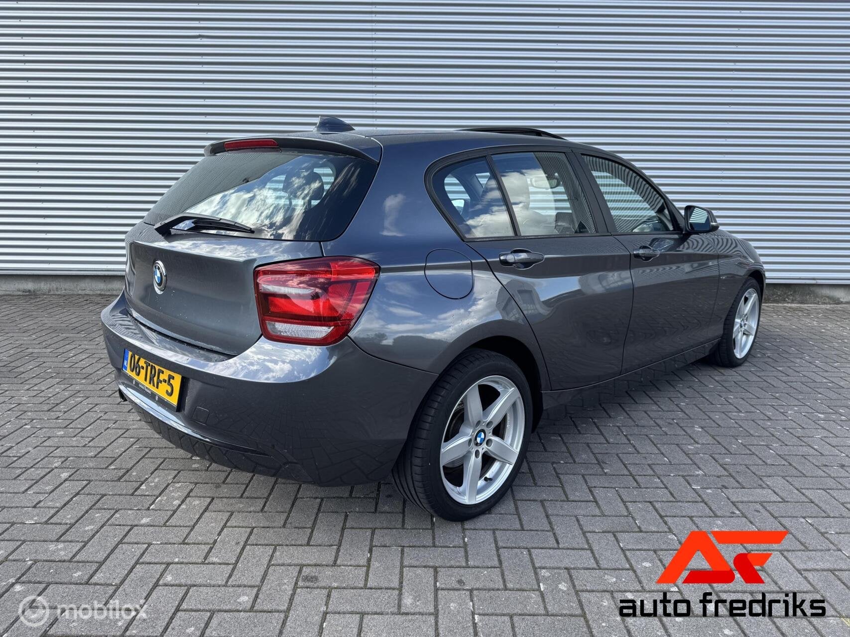 BMW 1-serie 116i Business+ Sport | Panorama dak | Navigatie, Auto's, BMW, 1-Serie, Euro 5, Gebruikt, 4 cilinders
