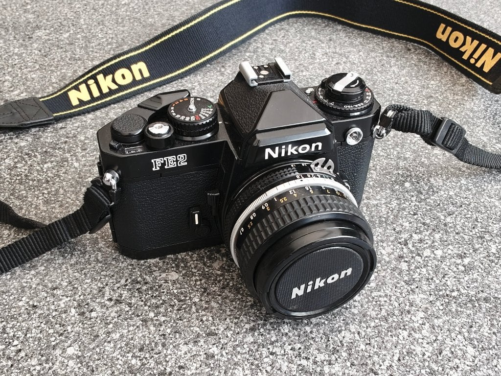 Nikon FE2 Spiegelreflexcamera - In Mint Conditie uit Japan, Audio, Tv en Foto, Fotocamera's Analoog, Ophalen of Verzenden, Zo goed als nieuw