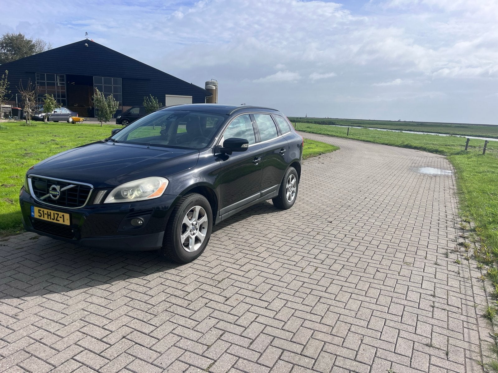 Volvo XC60 2.4 D5 AWD Geartronic 2009 Zwart, Auto's, Automaat, 1716 kg, 197 €/maand, 2000 kg