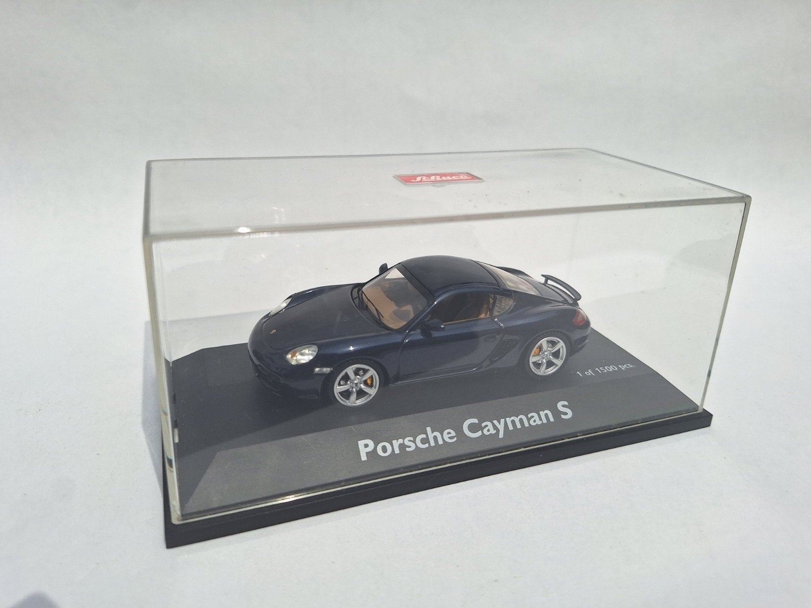 Porsche Cayman S - diep donkerblauw - Schuco - 1:43, Ophalen of Verzenden, Zo goed als nieuw, Auto, Schuco