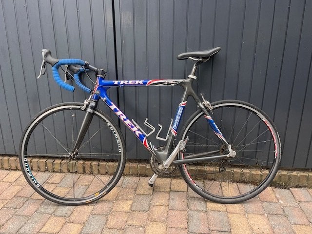 Trek racefiets uit US-postal tijdperk, 28 inch, Gebruikt, Carbon, 10 tot 15 versnellingen