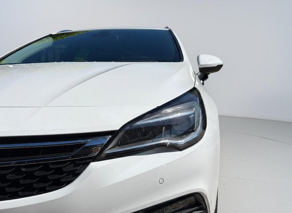 Opel Astra Sports Tourer 1.4 Online Edition TREKHAAK - CRUIS, Stof, Gebruikt, 150 pk, Wit