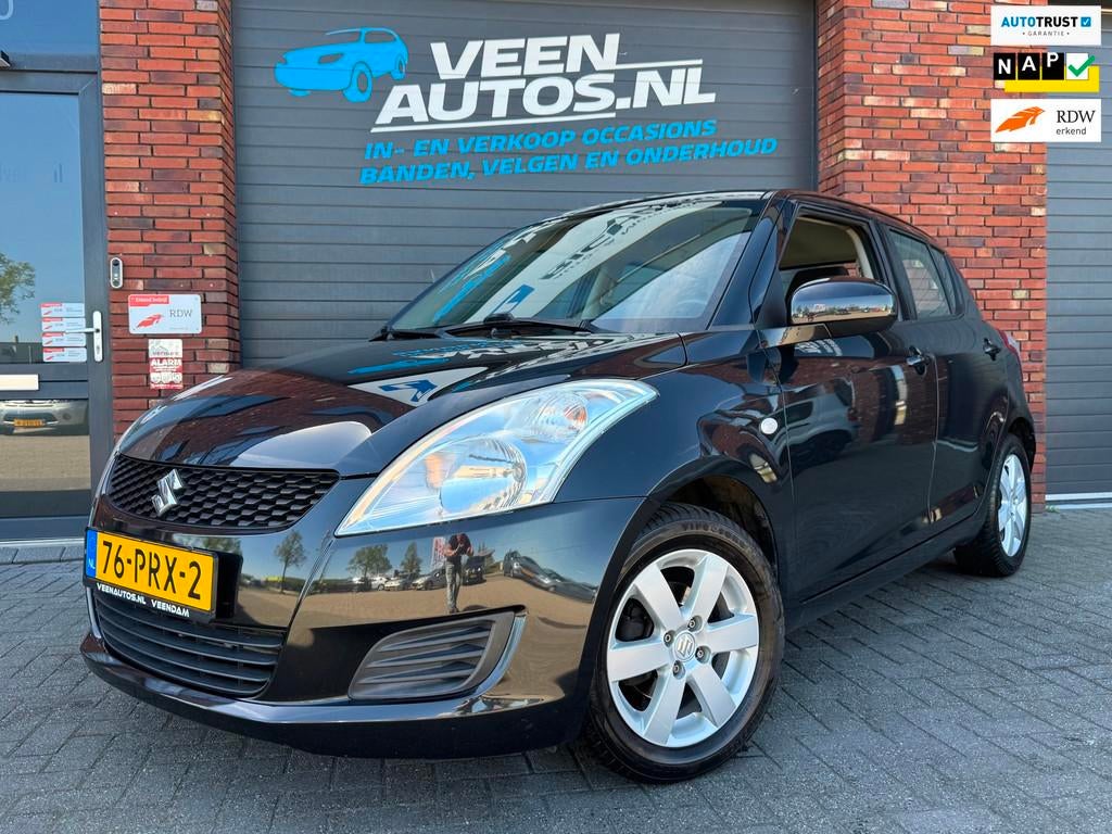 Suzuki Swift 1.2 Comfort EASSS Airco Stoelverwarming NAP, Auto's, Voorwielaandrijving, Gebruikt, 4 cilinders, Stoelverwarming
