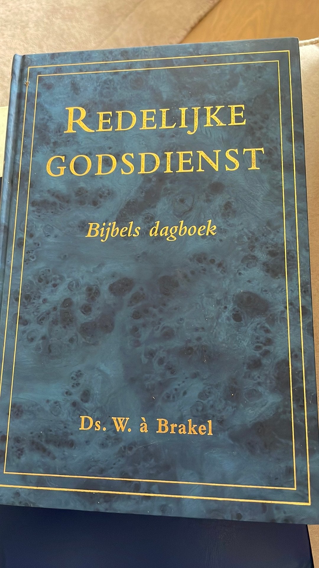 Redelijke Godsdienst - Bijbels dagboek Ds. W. à Brakel, Ophalen of Verzenden, Zo goed als nieuw, Christendom | Protestants