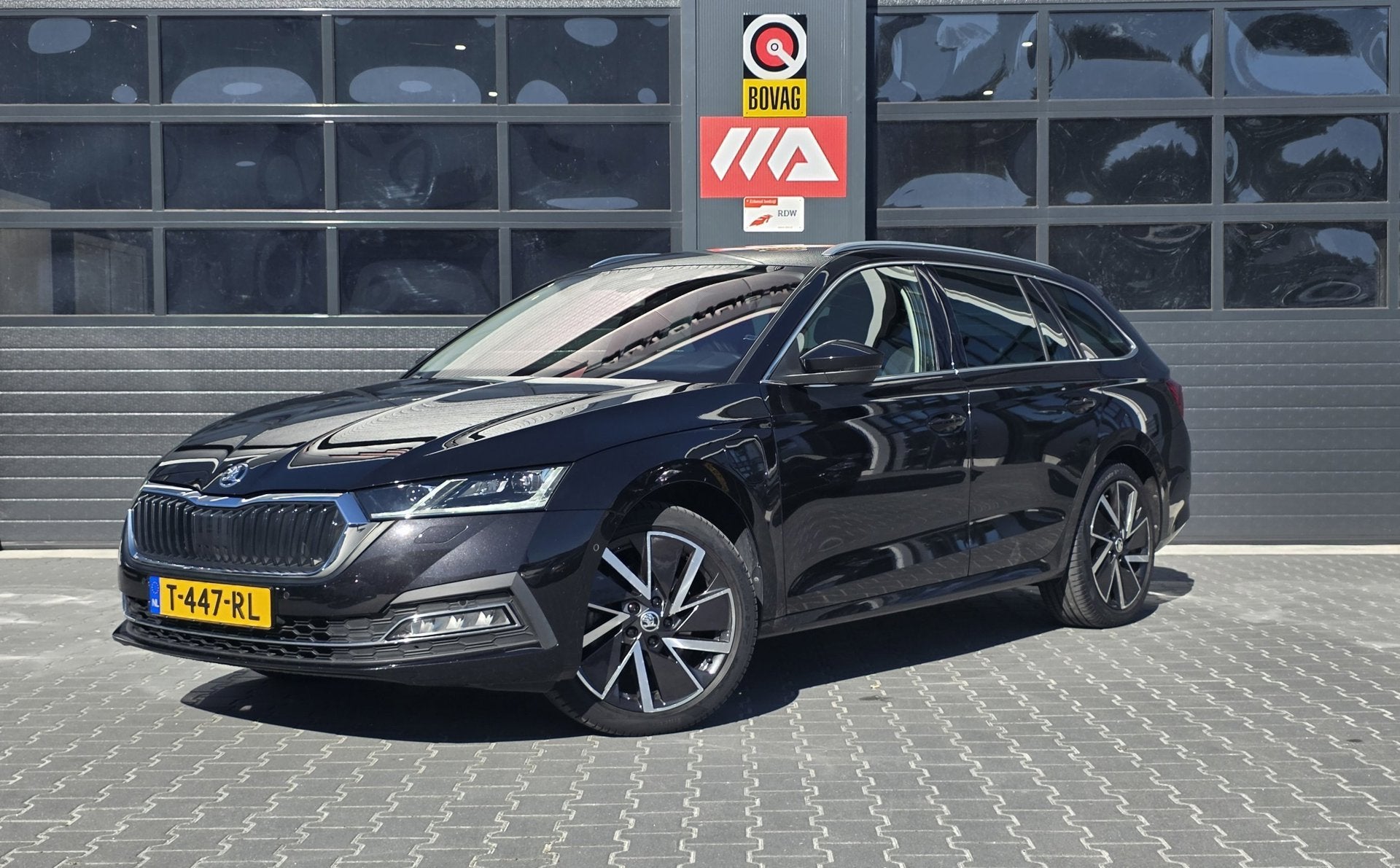 Skoda Octavia Combi 1.4 TSI iV PHEV Business Edition Plus |, Auto's, Dealer onderhouden, Gebruikt, 150 pk, Leder en Stof