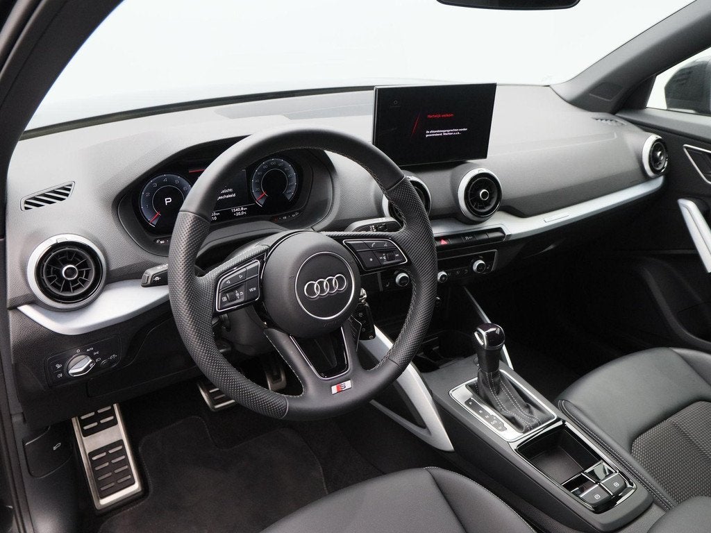 Audi Q2 35 TFSi 150 Pk S-Line Automaat | Full LED | Navigati, Auto's, Audi, 150 pk, Leder en Stof, Zwart, Origineel Nederlands