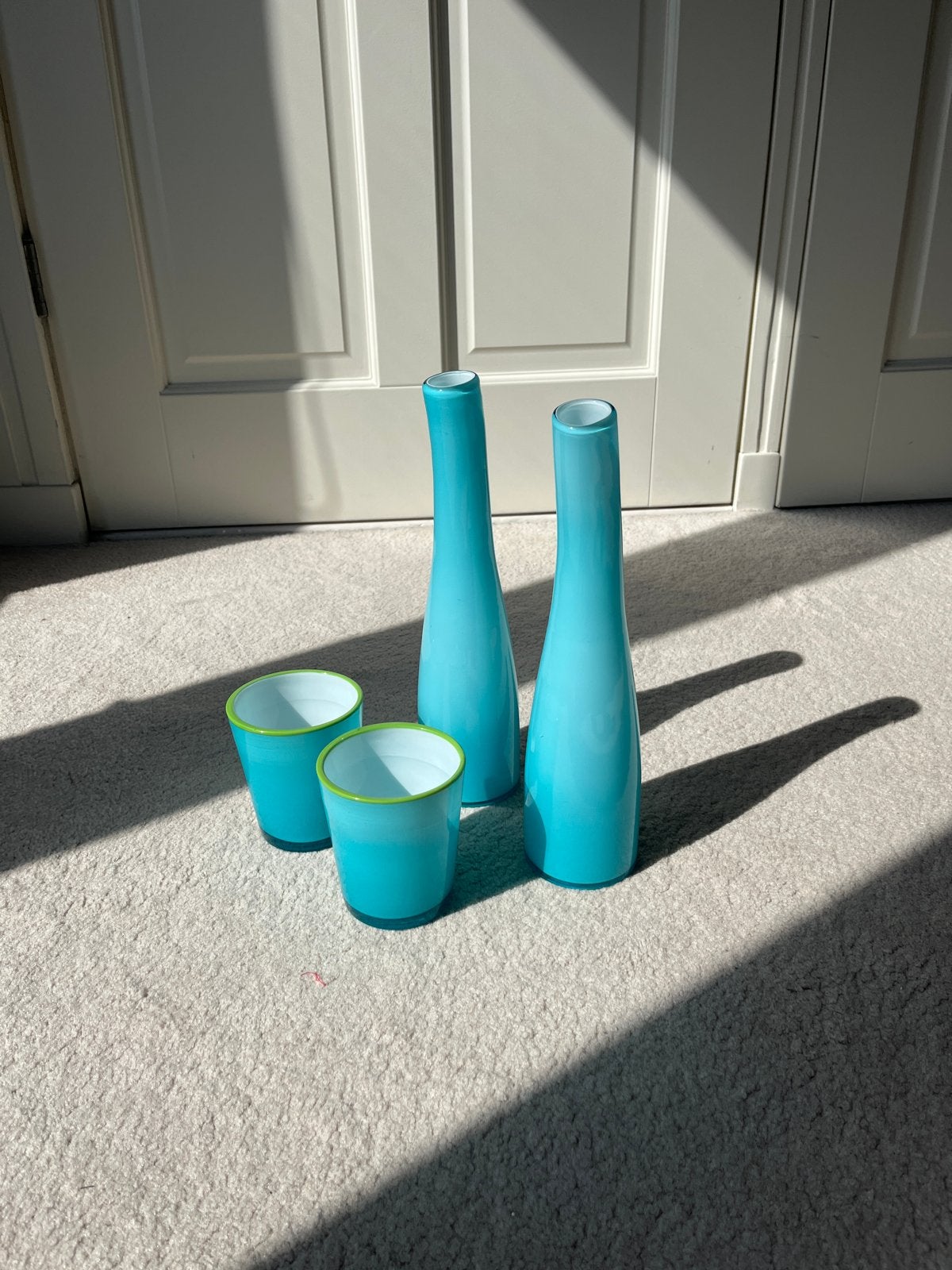2 turquoise vaasjes met bijpassende waxinelichthouders, Ophalen of Verzenden
