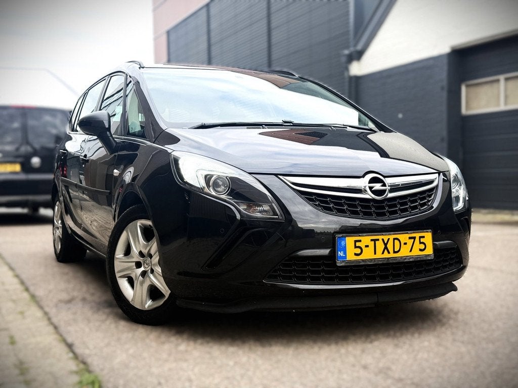 Opel Zafira Tourer 1.4 Rhythm|Navi|Cruise|Trekhaak, Auto's, Gebruikt, Huisgarantie, 4 cilinders, Met garantie (alle)