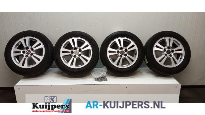 Sportvelgenset + banden van een Saab 9-3, Gebruikt, -, -, -