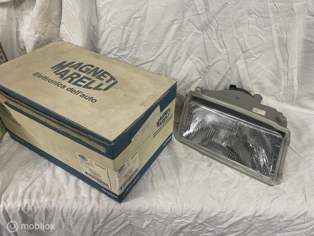 Koplamp origineel rechts Fiat Uno (Turbo) 1989 - < in doos, Nieuw, Ophalen of Verzenden
