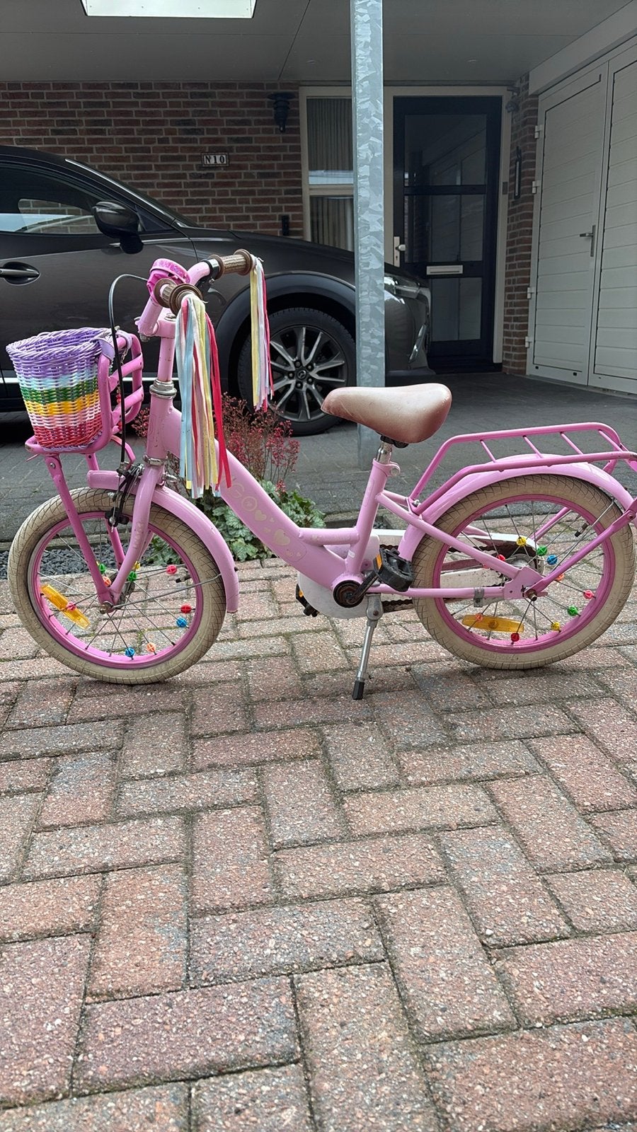 Roze 16 inch kinderfiets met mandje en bagagedrager, Ophalen, Gebruikt, Terugtraprem, 16 tot 20 inch