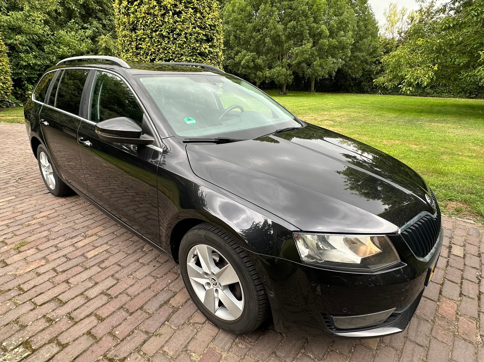 Skoda Octavia 1.6 TDI 77KW Combi Dsg-7 2014 Zwart, Stof, 4 cilinders, Zwart, Bedrijf