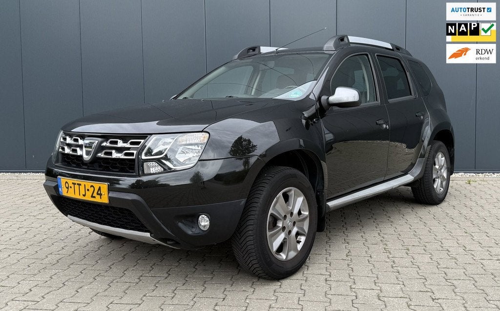 Dacia Duster 1.2 TCe 4x2 Prestige Airco Cruise Leder Navi Tr, Auto's, Dacia, Voorwielaandrijving, Euro 5, Gebruikt, Zwart